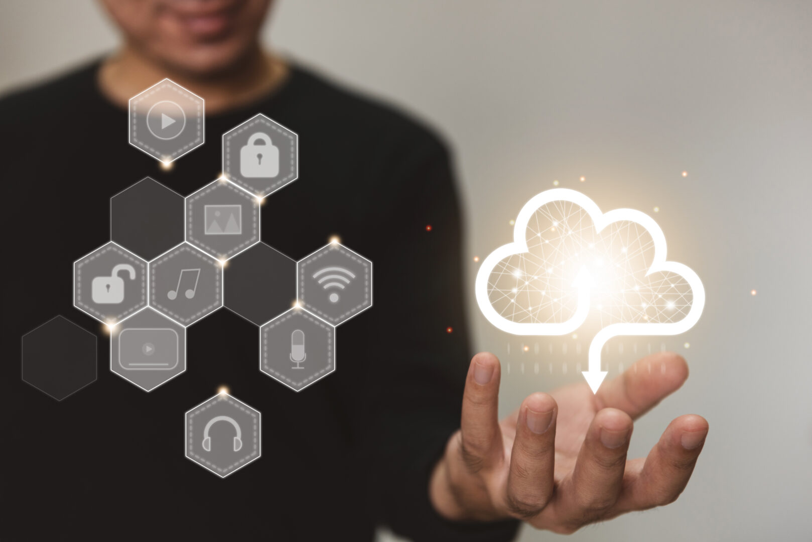 businessman-holding-a-cloud-data-icon-with-light-computing-data-2