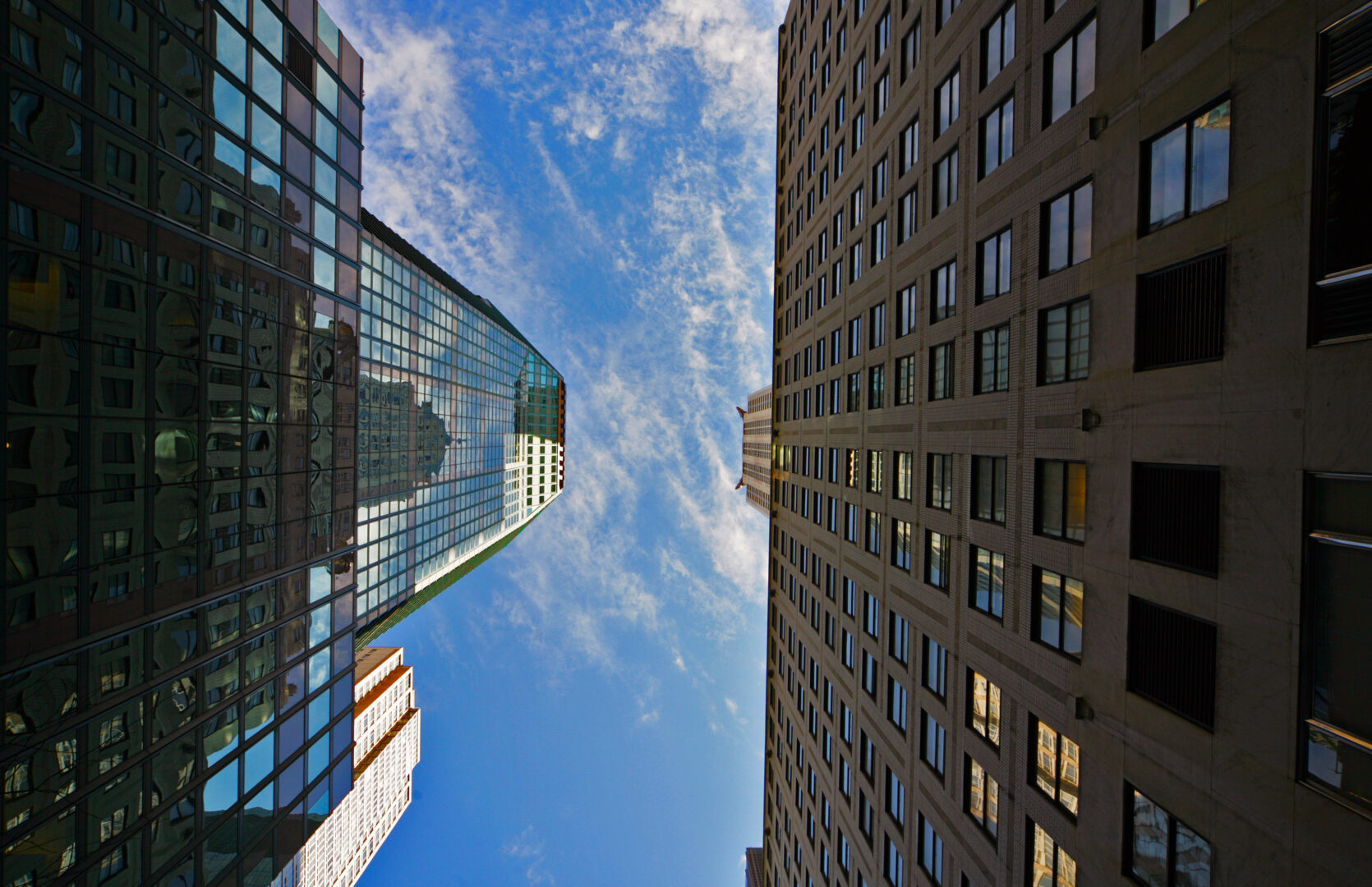 directly-shot-tall-building-against-sky