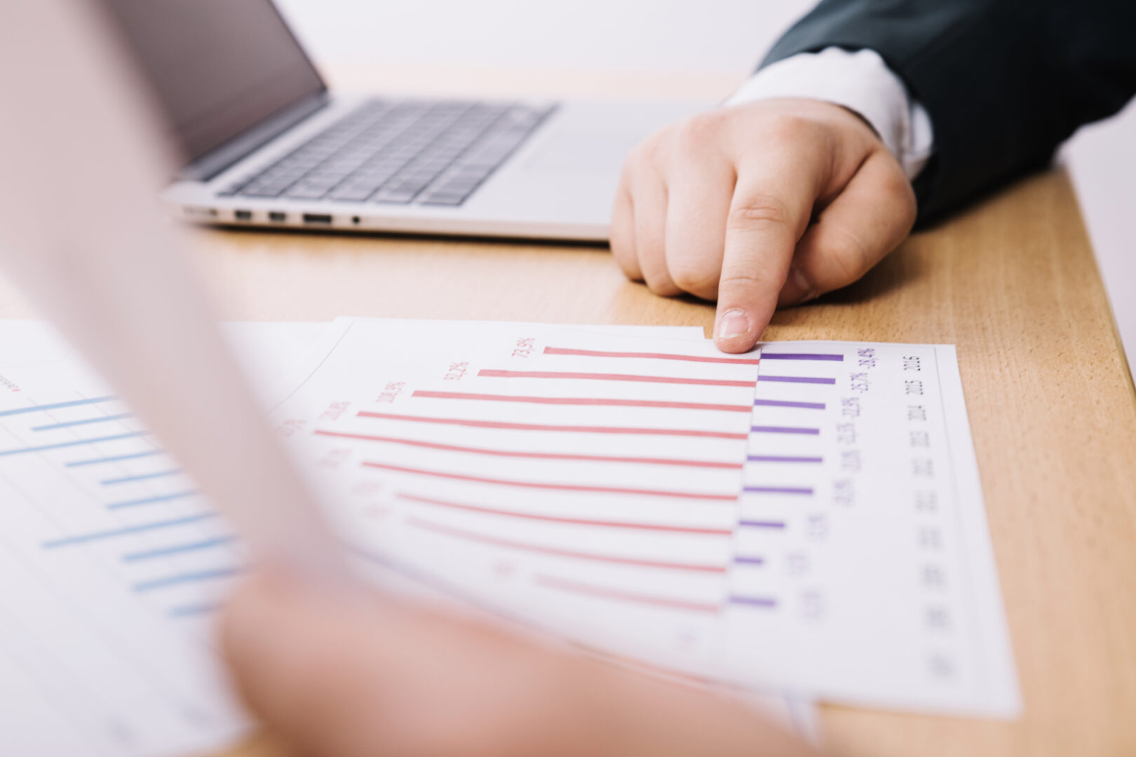 unrecognizable-men-working-with-papers